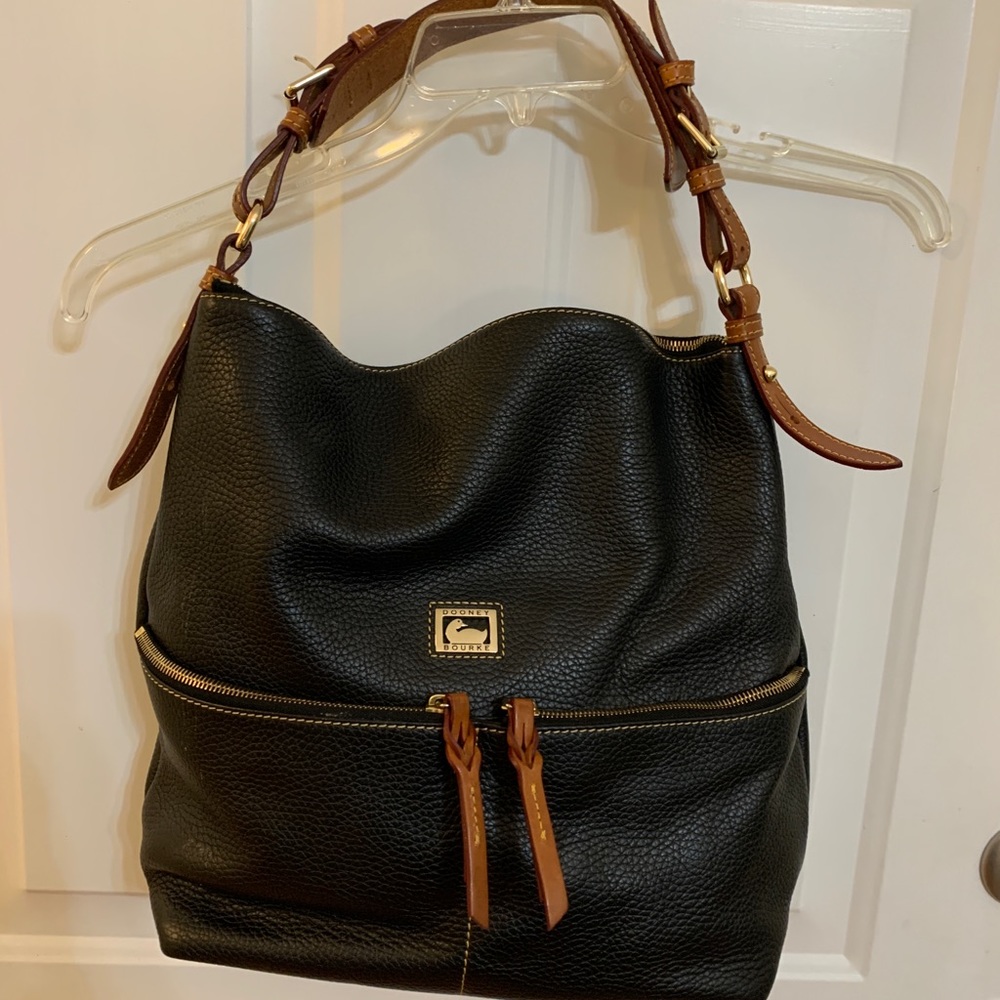 Black and brown Dooney and Burke purse.